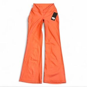NWT Orange Flared Leggings. M